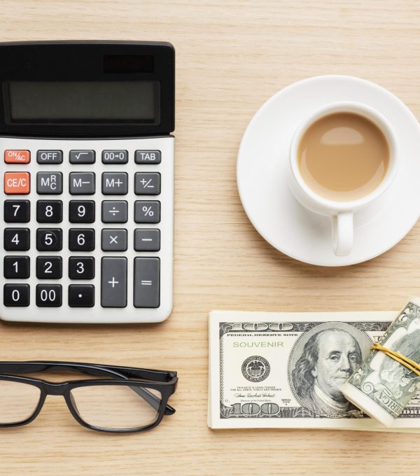 flat-lay-desk-arrangement-with-cash